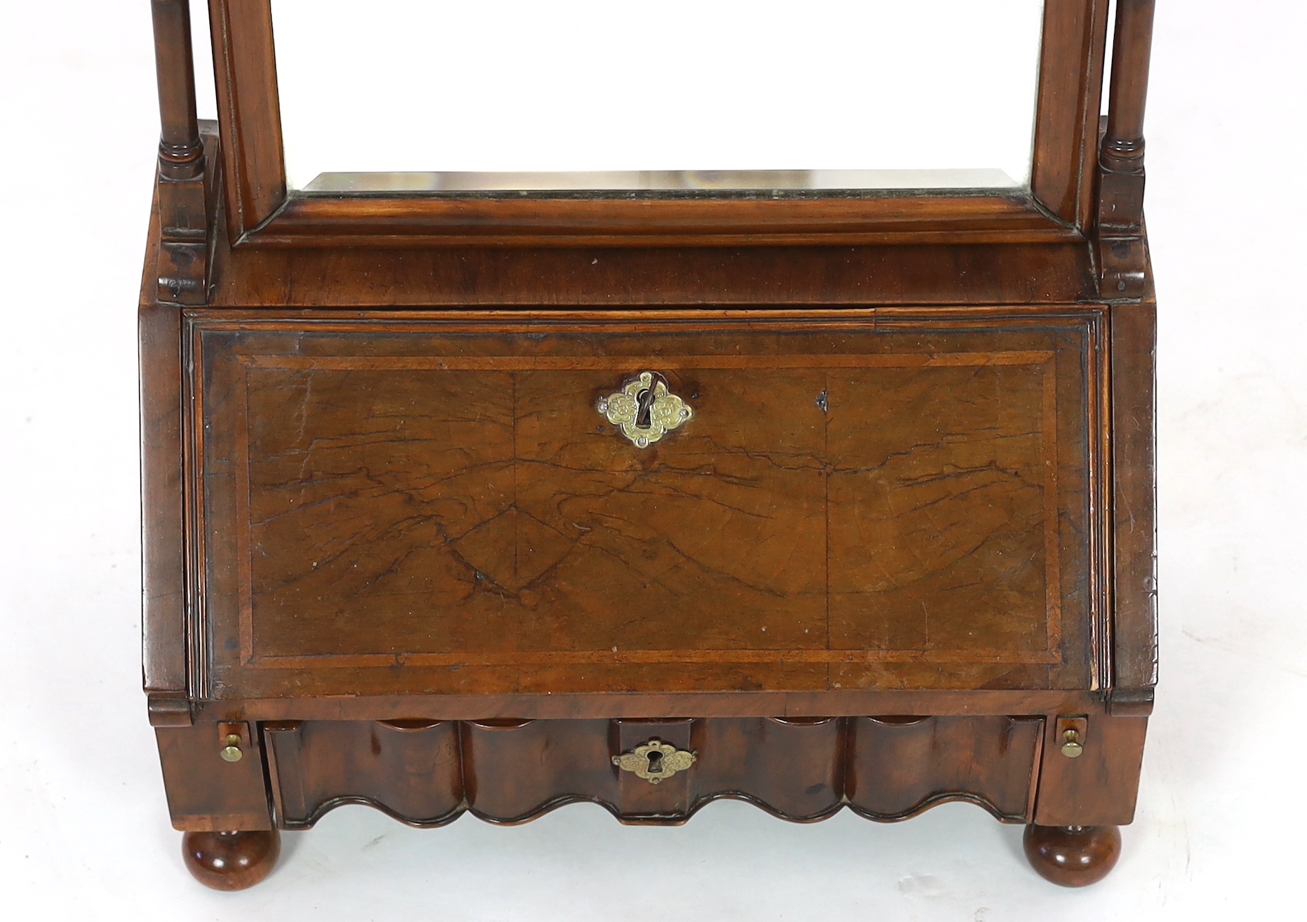 A Queen Anne walnut toilet mirror